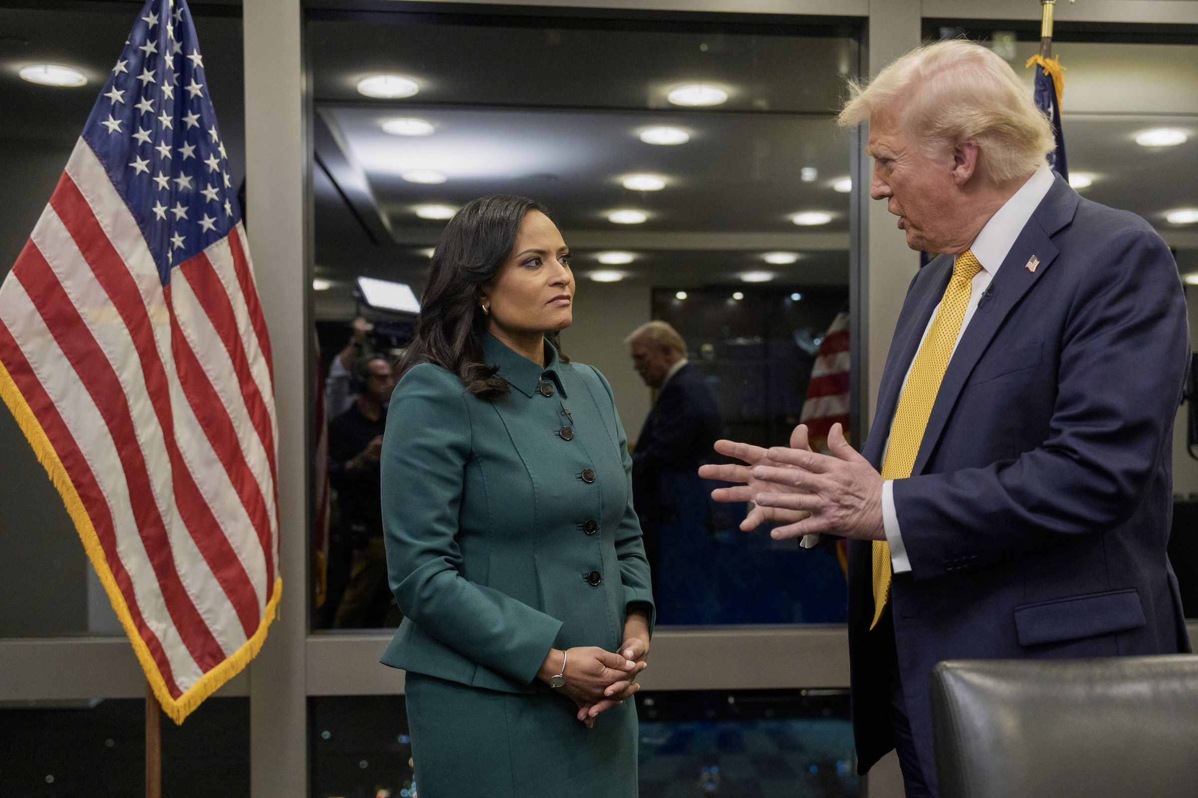 A picture of Donald Trump talking with Kristen Welker.